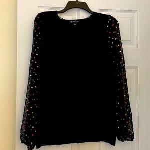 Festive INC top with sheer sleeves and neon color Polka dots.